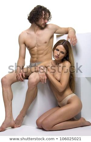 A naked boy and girl together