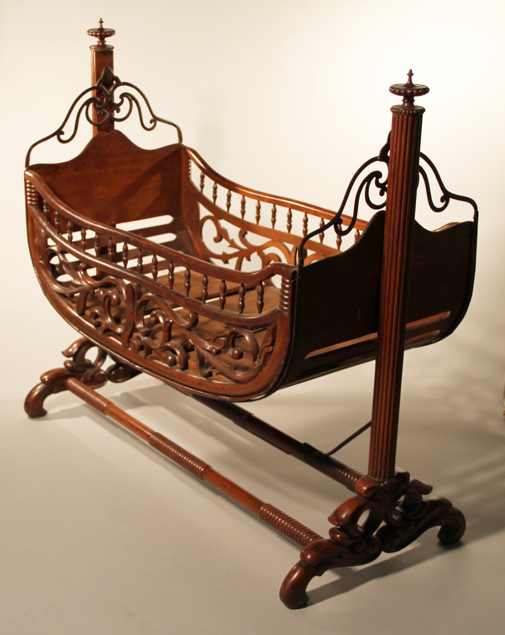 Antique victorian swinging bassinet