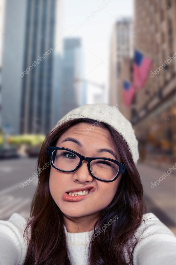 Asian girl making faces
