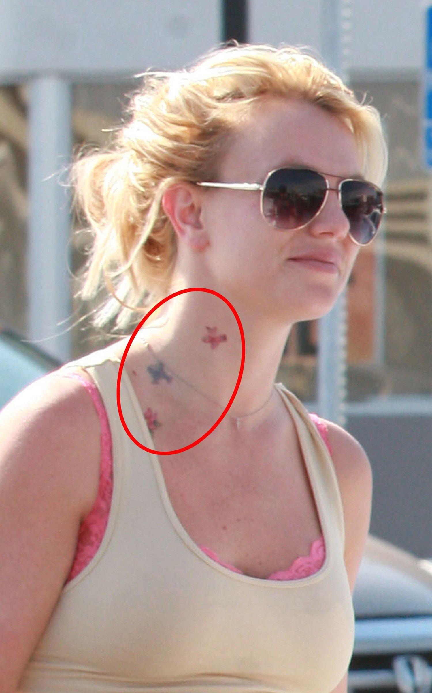 Aquamarine reccomend Britney head picture shaved spear tattoo