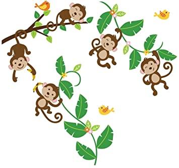 Pictures of monkeys swinging on vines